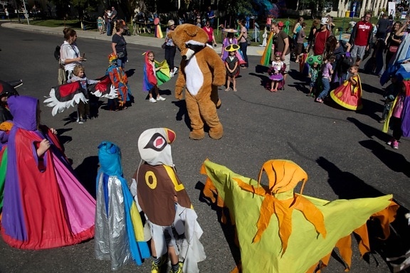 child, costumed, performers