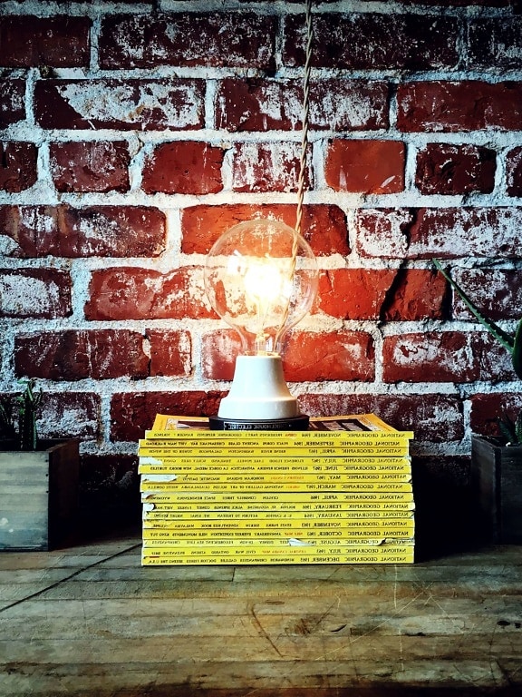 wooden surface, books, texture, bricks, wall lamp, light bulb
