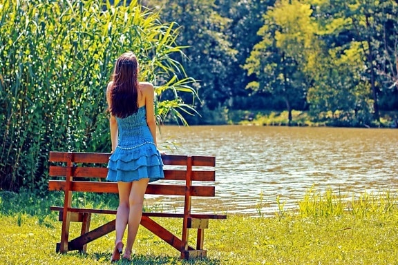 girl, blue dress, standing, bench, lake