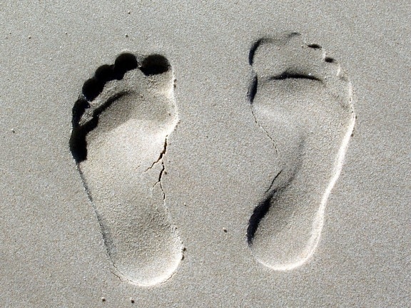 human footprints, sand