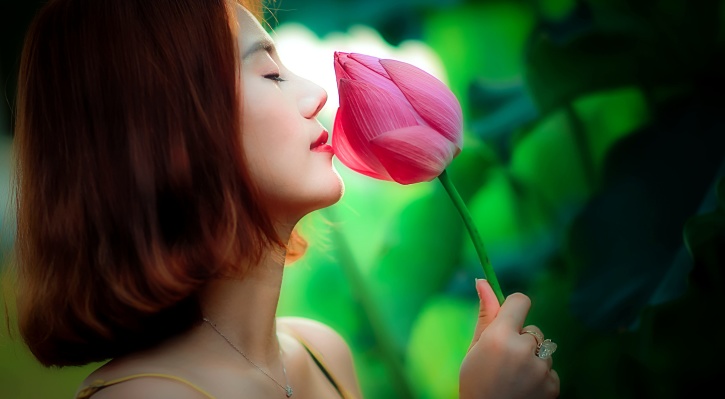 beautiful women, smelling rose