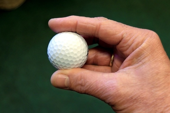 hand, golf ball
