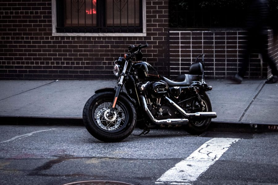motorcycle, parked outside, street