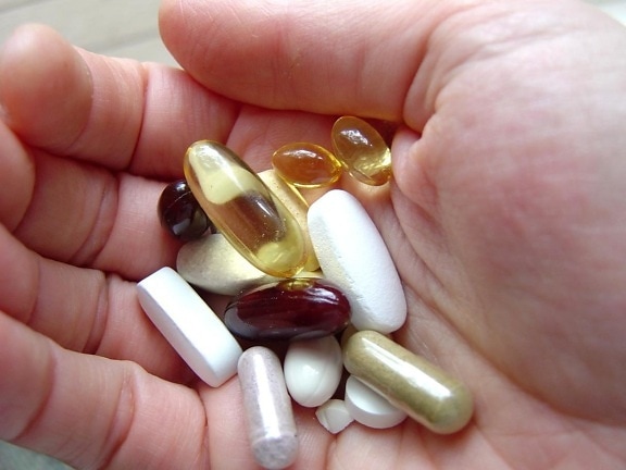 hand, medicines, pills, health care, vitamins, minerals, diet supplements