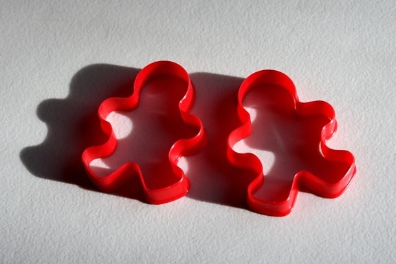 red plastic, cookie cutters