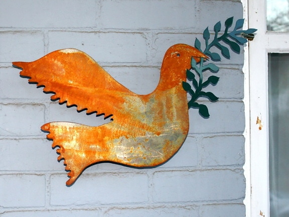 metal ornament, rust, exterior, wall, peace, dove bird, outdoor