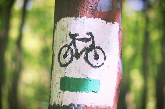 bicycle route, sign, painted tree, tree trunk