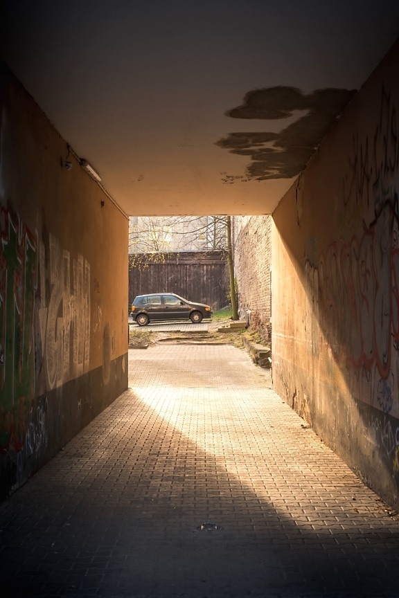 road, shadow, street, tunnel, vehicle, wall, abandoned, alley, architecture