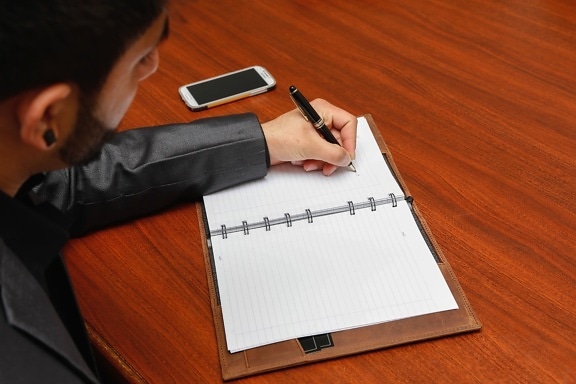 Notebook, papier, biurko, człowiek, ołówek, osoba, tabela, pisanie