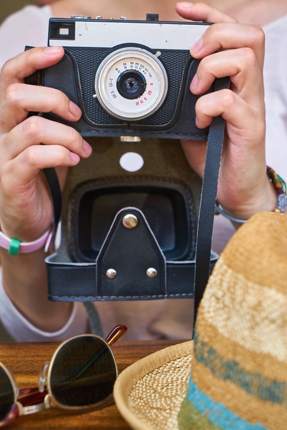 photo camera, hands, hat, exposure, photo, photographer, table