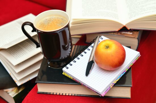 coffee cup, apple, pencil, book