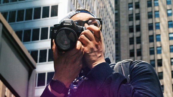 photographer, building, eyeglasses, man, window, city, lens