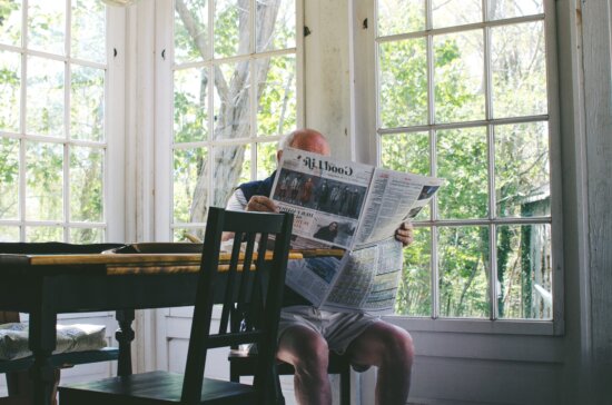 old man, newspaper, interior, room, furniture