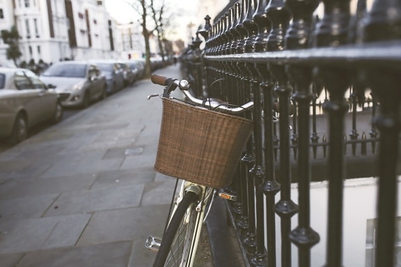 wicker basket, classic bicycle, street, iron, fence