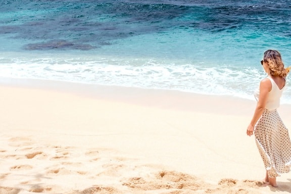 woman sunbathing on beach, sand, water, ocean, sea, seashore, summer