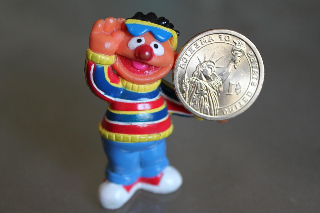 toy, figurine, metal coin, plastic, colorful