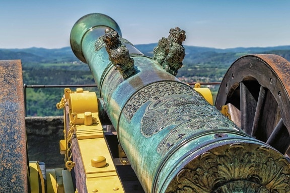 sky, outdoor, antique, cannon, fortification, sky, daylight, iron, metal