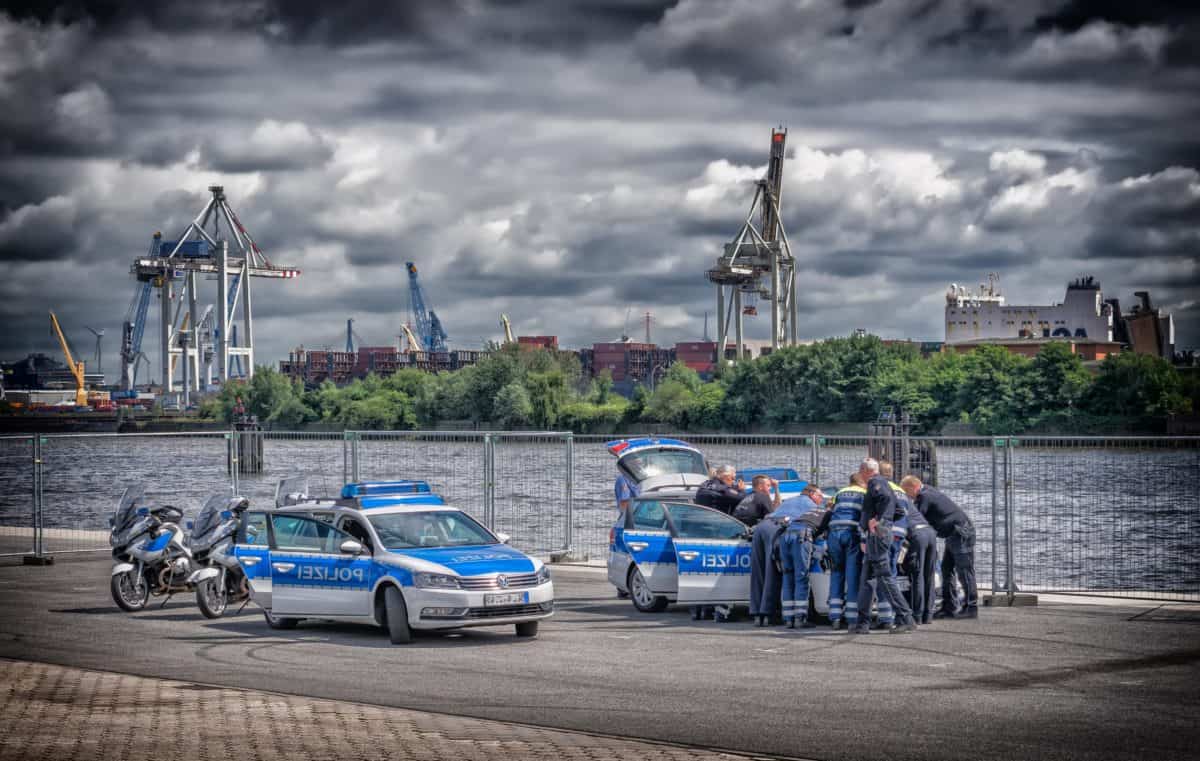 vehicle, sky, car, outdoor, road, river, police