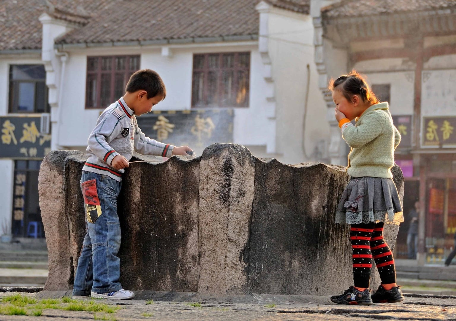 child. door. childhood. young. village. urban area. wall. people. window. u...