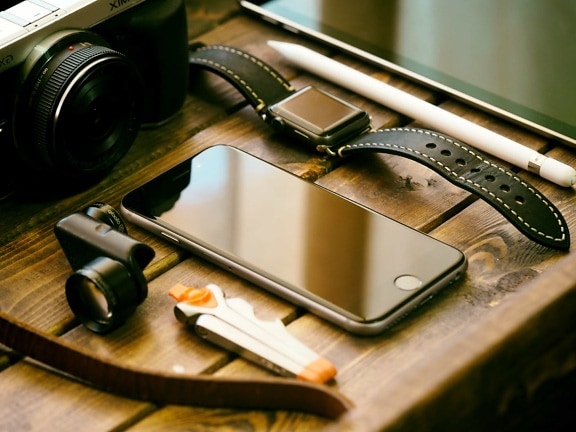 cellphone, wristwatch, equipment, object, wood, photo camera, photo studio