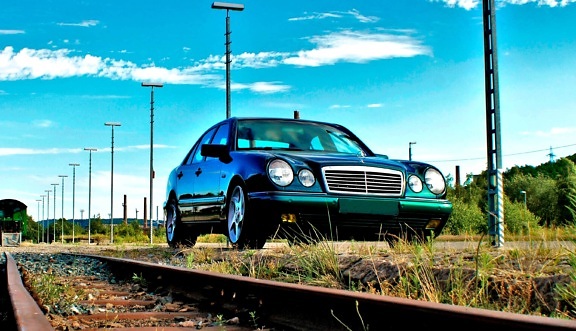 vehicle, luxury car, road, transportation, blue sky, railroad, railway