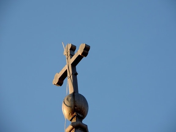 christianity, cross, device, outdoors, blue sky, daylight, people, bird