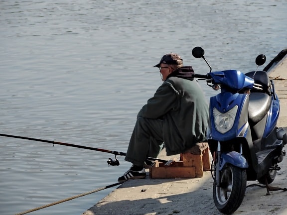 coast, fishing, fishing gear, man, motorcycle, sea, water, people