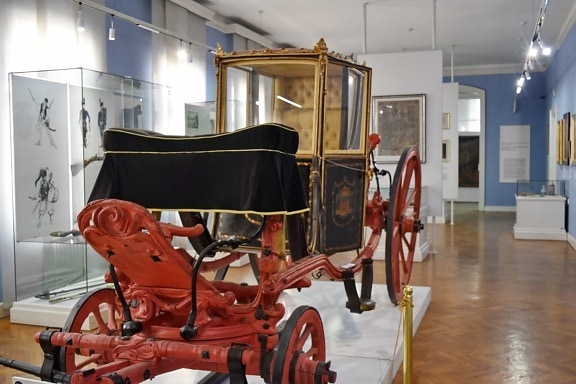 interior decoration, museum, carriage, vehicle, furniture, indoors, room, home