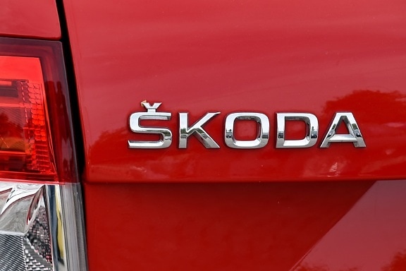 Skoda, red, sign, symbol, text, bumper, outdoors, business, car, vehicle, plastic