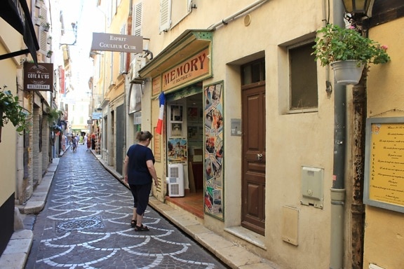 narrow, street, tourist attraction, woman, city, architecture, shop, sidewalk, building, bookshop