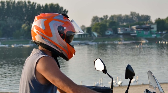 helmet, lake, motorcycle, motorcyclist, swan, water, competition, vehicle, recreation, action