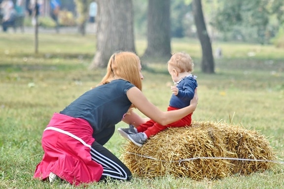 baby, daughter, farmland, hay field, mother, rural, grass, field, child, hay