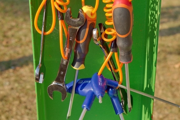 hand tool, screwdriver, wrench, scissors, equipment, plastic, steel, tool, nature, grass
