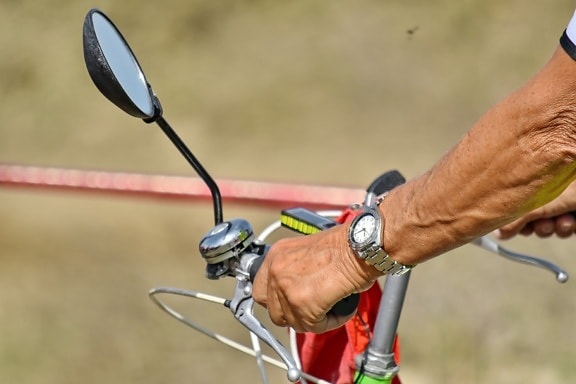 bicycle, mirror, steering wheel, wristwatch, outdoors, recreation, leisure, wheel, man, sport
