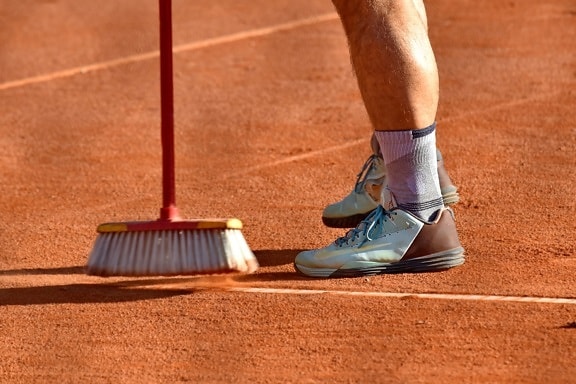 cleaning, dust bowl, footwear, preparation, sneakers, tennis court, broom, stadium, competition, recreation