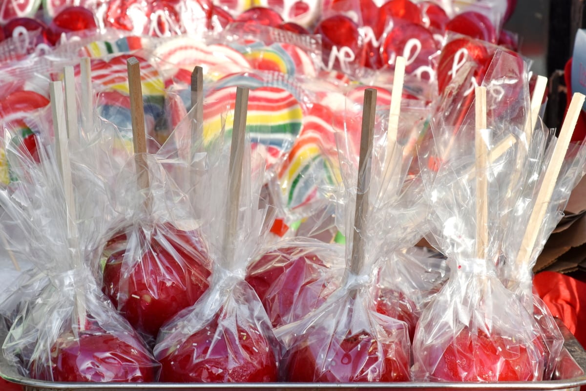 apples, gelatin, red, sticks, sugar, container, candy, bright, delicious, food
