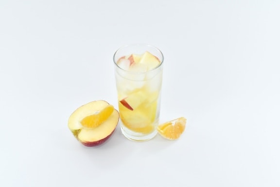 apple, beverage, glass, ice crystal, liquidity, mandarin, slices, drink, cold, fruit