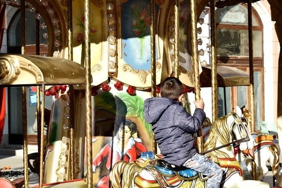boy, child, childhood, riding, people, carousel, mechanism, carnival, ride, street