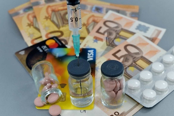 cost, drugs, emergency, euro, Europe, medical care, paper money, pills, prescription, medicine