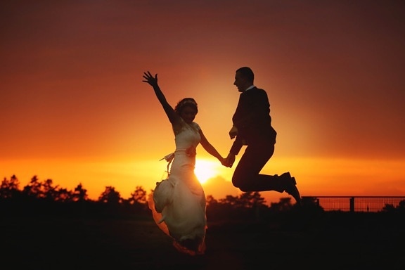 bride, cheerful, groom, happiness, jump, jumping, people, sunset, silhouette, sun