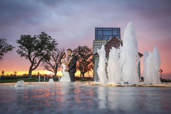 bride, groom, sunset, fountain, structure, water, people, woman, outdoors, dawn