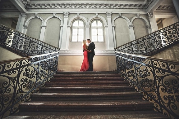 cast iron, glamour, handsome, hug, interior design, kiss, pretty girl, staircase, stairway, device