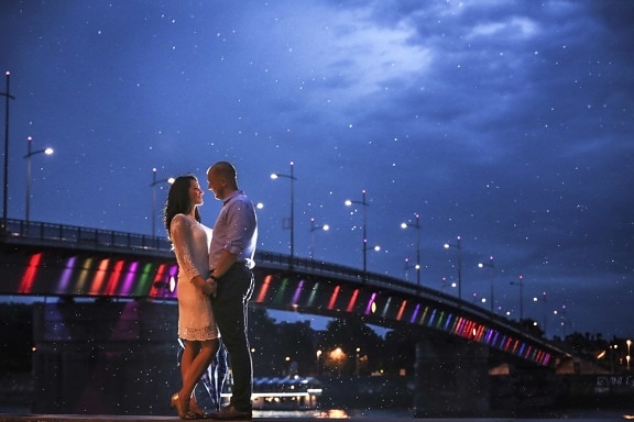 boyfriend, bridge, cityscape, evening, girlfriend, hug, kiss, moonlight, night, rain