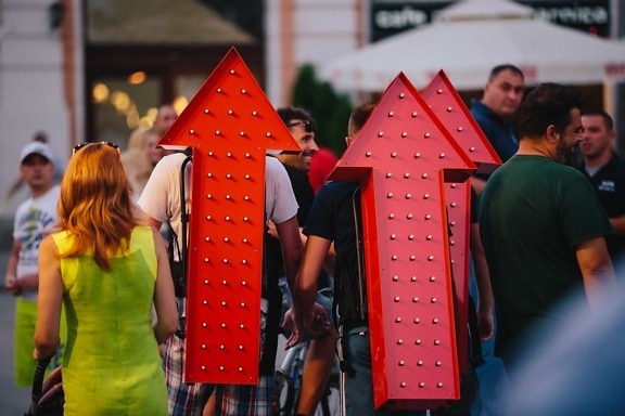 arrow, crowd, downtown, evening, event, manifestation, object, person, people, happy