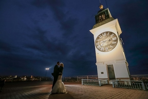 husband, bride, spotlight, tower, nightlife, analog clock, landmark, building, clock, architecture