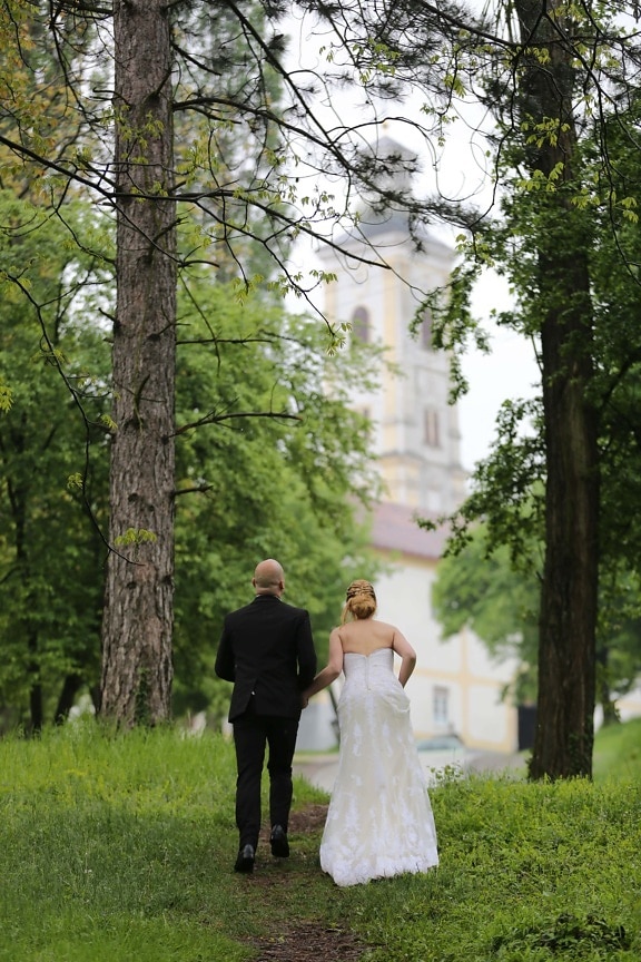 husband, bride, aspen, walking, hillside, church tower, park, conifers, wedding, groom