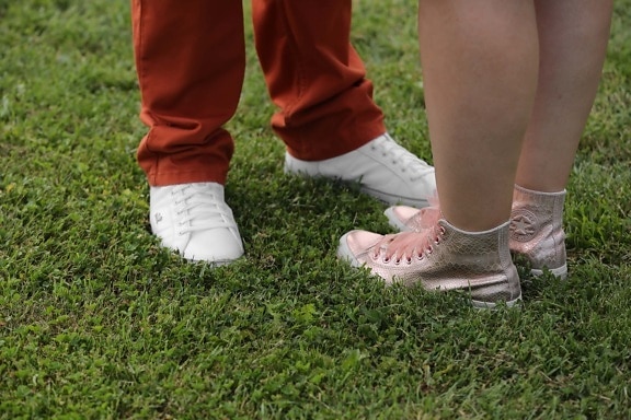 sneakers, boyfriend, girlfriend, grass, pants, legs, foot, footwear, shoe, lawn