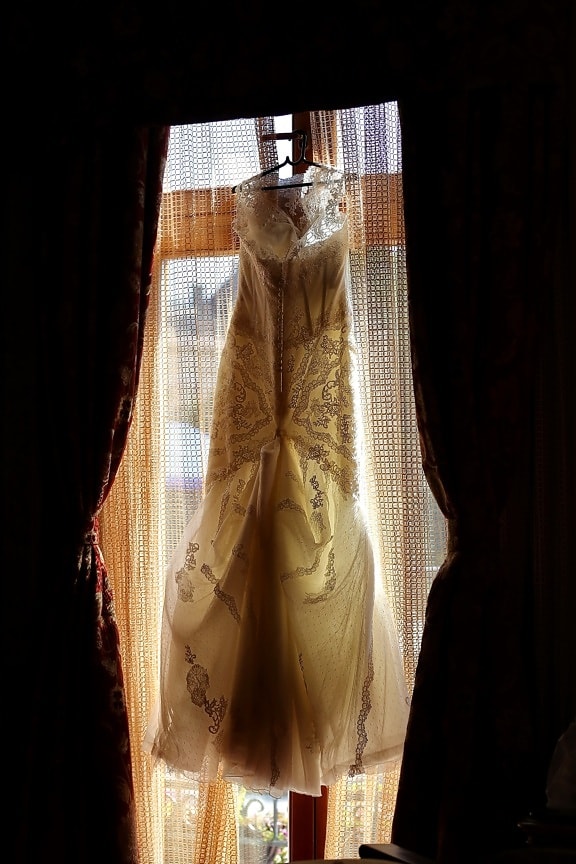 wedding dress, hanging, window, backlight, covering, clothing, statue, style, fashion, garment