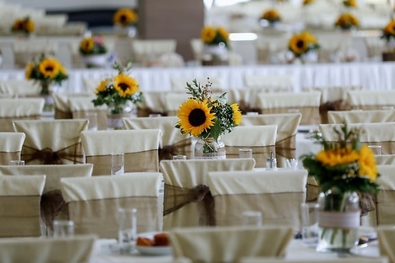 sunflower, tablecloth, vase, dining area, tables, silverware, cutlery, table, tableware, dining
