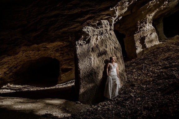 cave, posing, pretty girl, darkness, rock, tunnel, dark, light, girl, shadow